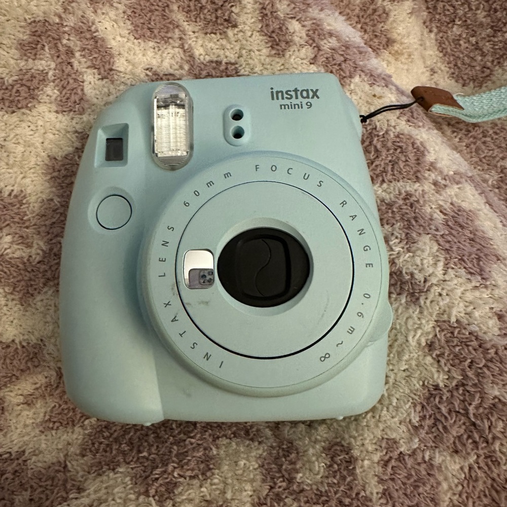 Instax mini 9 Polaroid camera.